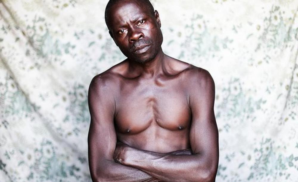 John Muyiisa is one of the Bugula islanders dispossessed by the IFAD-supervised oil palm plantation that has robbed him of his land and livelihood - and a co-plaintiff in teh legal action that is launched today. Photo: Jason Taylor / FoEI).