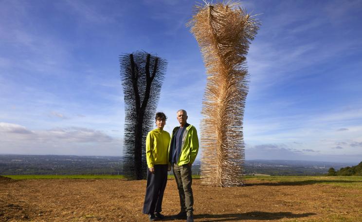 Artists Ackroyd and Harvey pictured in front of their artwork, Ash to Ash