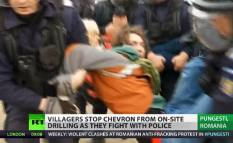 Villagers clash with riot police at Pungesti. Image: RT.com