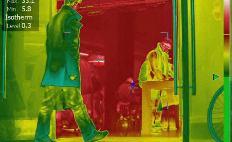 Infra-red image showing how open shop doors pour heat into our streets. Image: closethedoor.org.uk