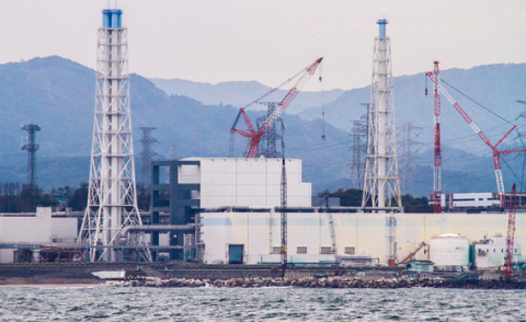 The damaged Fukushima Daiichi Nuclear Power Station as seen during a sea-water sampling boat journey, 7 November 2013. Photo: IAEA Imagebank via Flickr.com.