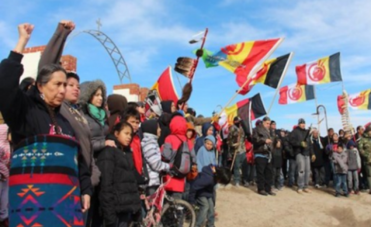 Lakota members marched during the annual Liberation Day commemoration of the Wounded Knee massacre. Photo: Deep Roots United Front / Victor Puertas.
