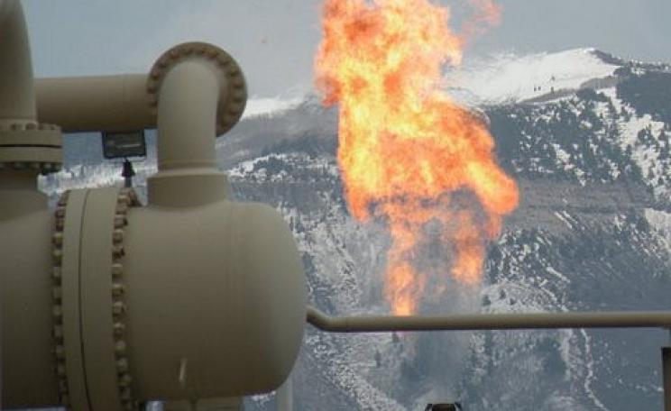 Flaring of unwanted hydrocarbons at a natural gas refinery in the Piceance Basin of Colorado. Photo: Tim Hurst  via Flickr.