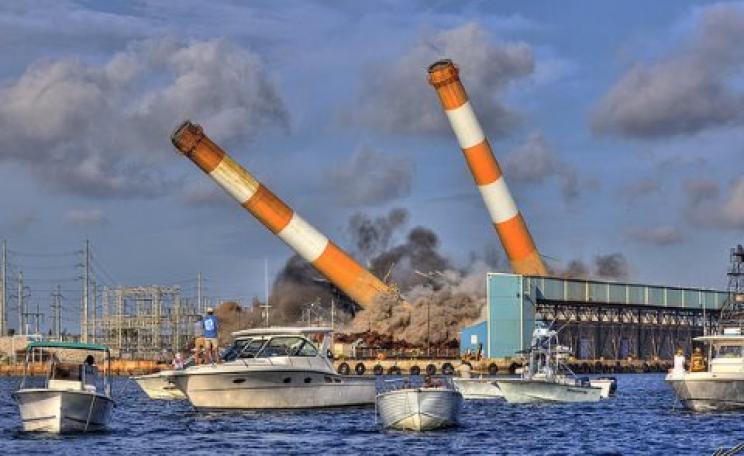 The end of fossil fuel emissions is not the end of global warming! Florida Power & Light's smokestacks come down at Riviera Beach. Photo: Kim Seng via Flickr.