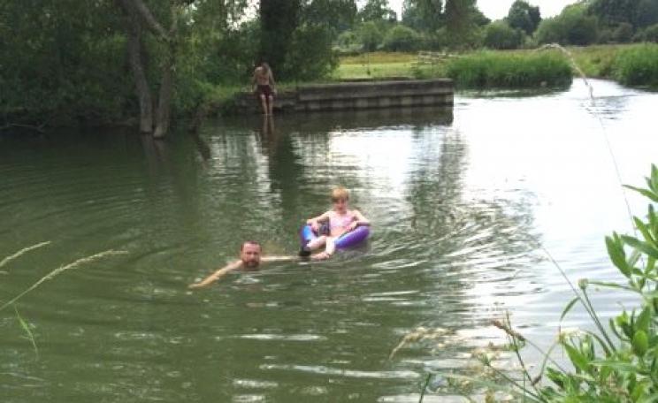 Families swimming in the Thames at Long Bridges, Oxford earlier this month. Photo: Zoe Broughton.
