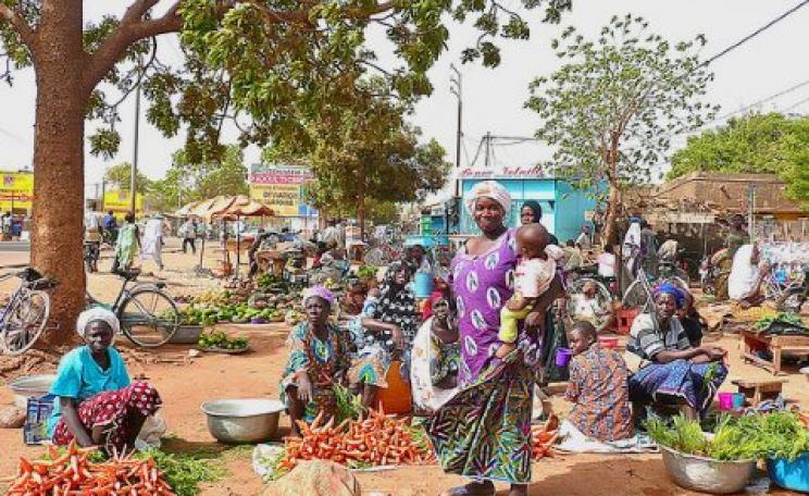 The ordinary people of Burkina Faso have seen little or no benefit from the neo-colonial model of development imposed by outside powers. Photo: market in Ouagadougou by Rita Willaert via Flickr.