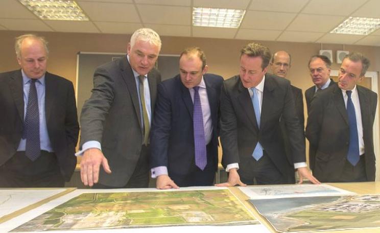 David Cameron, the Prime Minister, and Edward Davey, Secretary of State for Energy, join EDF's top brass to view plans for the Hinkley C nuclear power plant. Photo: Number 10 via Department of Energy and Climate Change / Flickr (CC BY-ND 2.0).