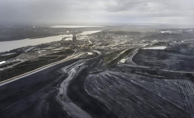 The Alberta tar sands aren't just destroying forests and waters on an industrial scale - they are also destabilising the global economy. Photo: Luc Forsyth via Flickr (CC BY-NC 2.0).