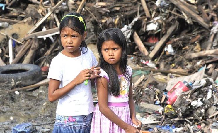 'The kingdom of God belongs to such as these'. Children in Tacloban City, Leyte Province, Philippines, amid the wreckage of Super Typhoon Yolanda / Hiyan, 21st December 2013. Photo: United Nations Photo via Flickr (CC BY-NC-ND).