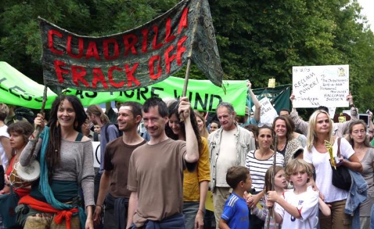 It's had an impact - on fracking companies' valuations: aAnti-fracking campaigners at Cuadrilla drilling site at Balcombe, West Sussex, August 2013. Photo: Sheila via Flickr (CC-BY-NC 2.0).