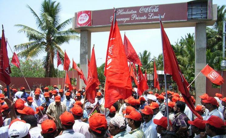 Protest at Coca Cola's bottling plant at Plachmada, Kerala. The plant has since been closed for rampant pollution. Photo: kasuga sho via Flickr (CC BY-NC-SA).