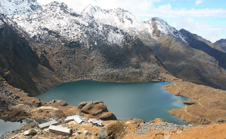 The sacred water of Gosainkunda Lake at the headwaters of the Trishuli River, soon to be changed forever by the construction fo a succession of high dams. Photo: Yosarian via Wikimedia Commons (CC BY).