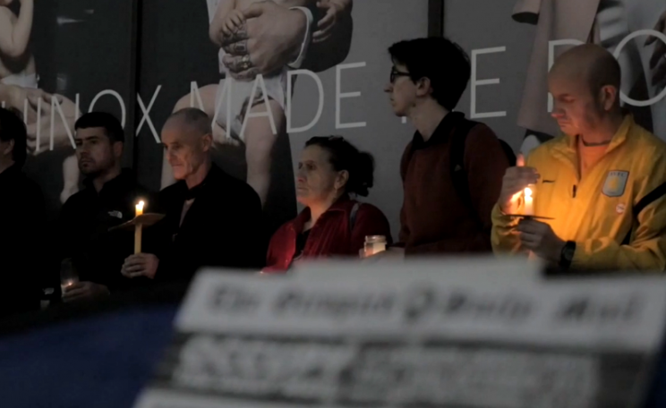 Candlelit vigil outside the Daily Mail offices in London to commemorate the estimated half million people dying every year as a result of climate change. Photo: Still from video by IndyRikki media.