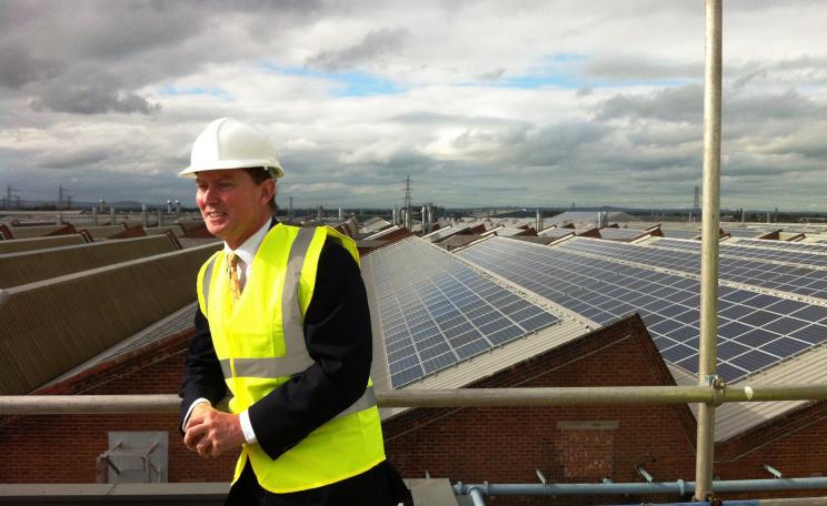 Minister Gregory Barker visits what was then the UK's largest rooftop solar array at Bentley Motors in Crewe, October 2013. Photo: DECC via Flickr (CC BY-ND).