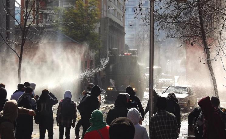 Water cannon deployed against a March for Education in Chile, 9th August 2011. Next time, it could be drones armed with incapacitating chemical agents. Photo: Mauricio Ulloa via Flickr (CC BY-NC-SA).