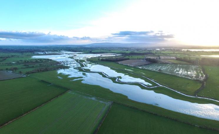 Flooded, embanked tributary of the River Eden in Cumbria. Image from a small unmanned aerial vehicle. Photo: Neil Entwistle @salfordhydro .
