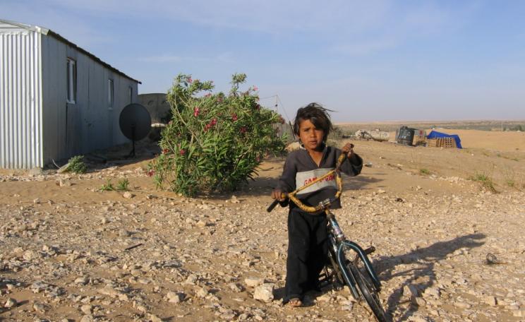 A child in one of the 'unrecognised' Bedouin villages of the Negev desert, Israel: an Israeli citizen, but one less equal than others. Photo: Physicians for Human Rights - Israel via Flickr (CC BY-SA).