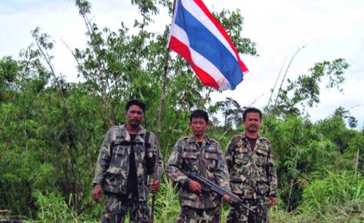 Soldiers came with the park officers. They planted a Thai flag and told the Karen to leave the village at once, or be shot. Photo: via CW.