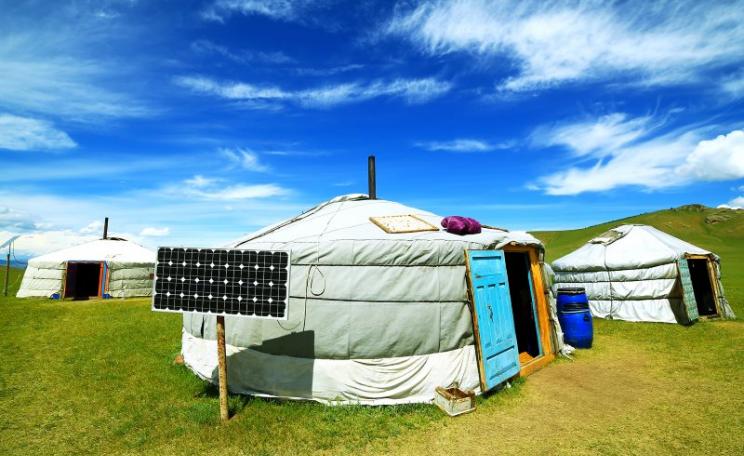 These yurts on Mongolia's 'sea of grass' are powered through a miniature solar microgrid that is both compact and lightweight for easy carriage on to the next site. Photo: Shutterstock.