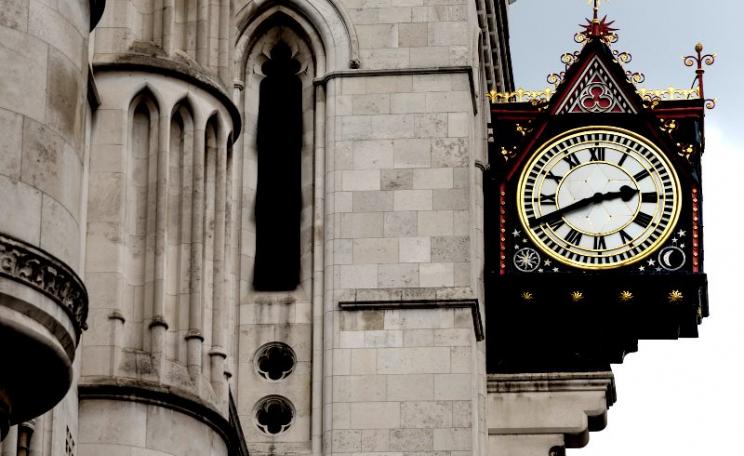The wheels of justice may grind exceedingly slow, but also exceedingly fine. Clock at the Royal Courts of Justice on the Strand, London. Photo: Andy Sedg via Flickr (CC BY-NC-ND).