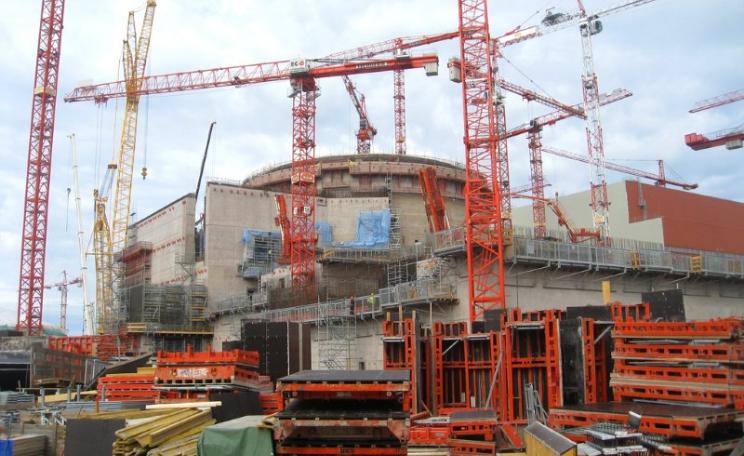 The disastrous Okiluoto 3 EPR reactor under construction in Finland. The project is taking twice as long to complete, and costing twice as much, as promised. Photo: BBC World Service via Flickr (CC BY-NC).