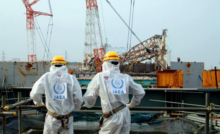 IAEA technicians examine Unit 4 of TEPCO's Fukushima Daiichi nuclear power station, the only one of four reactors to be stabilised - because it was  defuelled at the time of the earthquake and tsunami. Photo: IAEA Imagebank via Flickr (CC BY-SA).