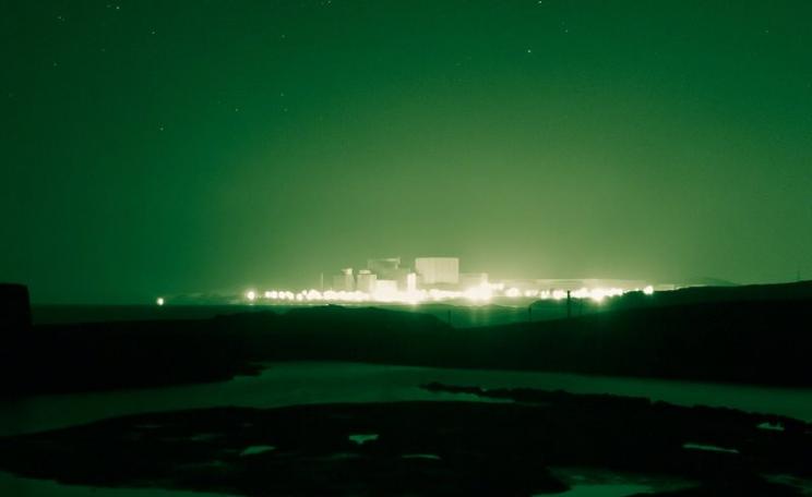 False promise ... Wylfa 2 nuclear power station glowing in the dark on Anglesey, Wales. Photo: Adrian Kingsley-Hughes via Flickr (CC BY-NC-ND).