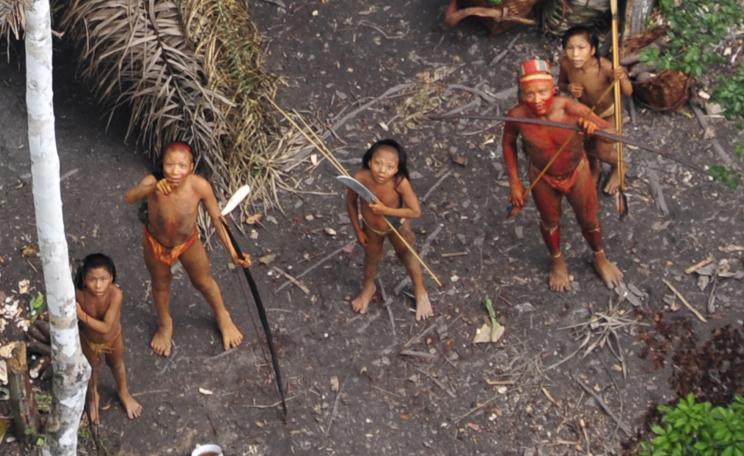 Uncontacted people, like these pictured in iconic aerial photos released in 2011, are the most vulnerable people on the planet © Survival