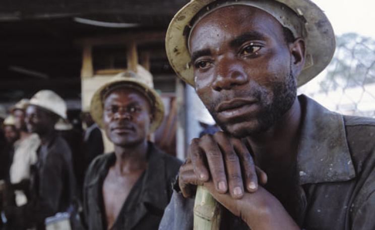Copper mine workers at NFC Africa Mining shaft in Chimbishi