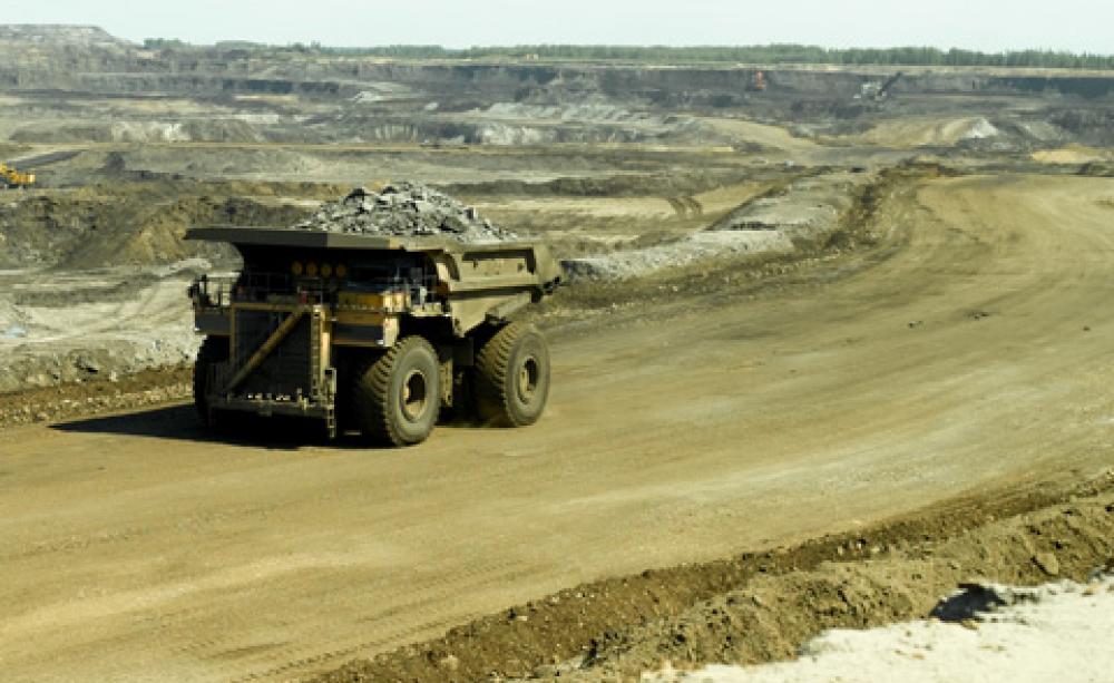Dumper truck on tar sands road