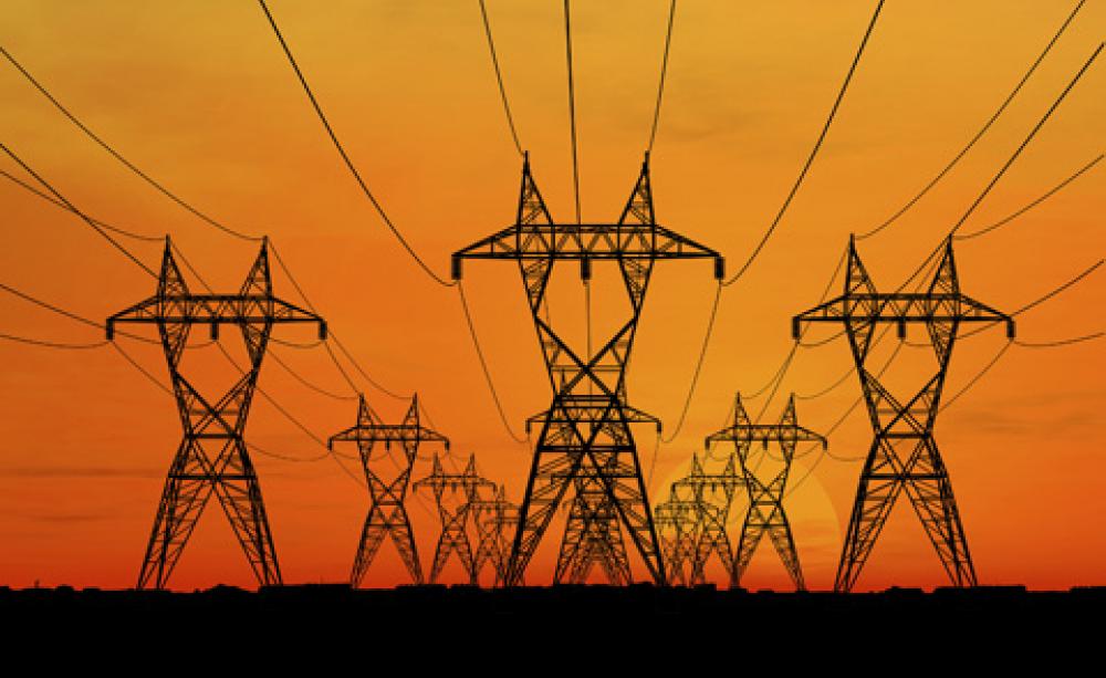 Electricity pylons at sunset