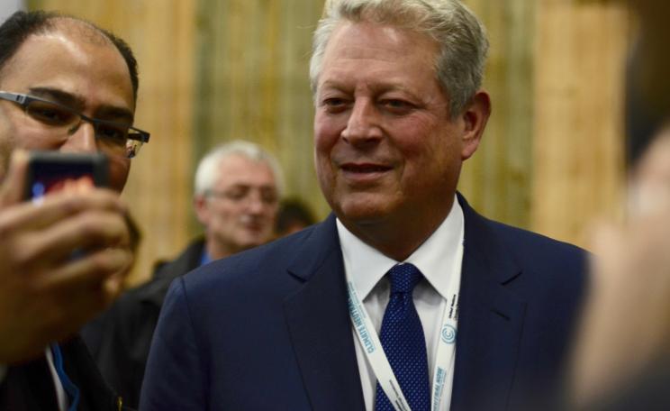 Man taking Al Gore's photograph