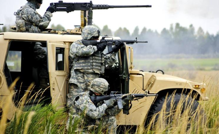US soldiers perform a platoon mounted and dismounted live-fire exercise at Grafenwoehr Training Area in Germany Oct. 6, 2010. Photo: Gertrud Zach / The U.S. Army via Fliclr (CC BY).