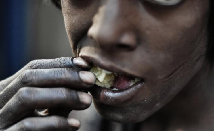 Hunger: a street-dweller in New Delhi, India. Photo: johnjodeery via Flickr (CC BY).
