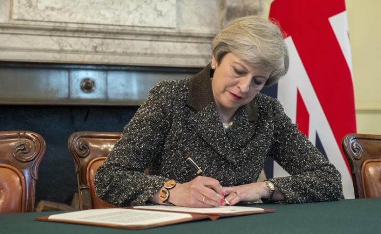 Prime Minister Theresa May signed her Article 50 setting out the UK's intention to withdraw from the European Union, 28th March 2017. Photo: Jay Allen / Number 10 via Flickr (CC BY-NC-ND).