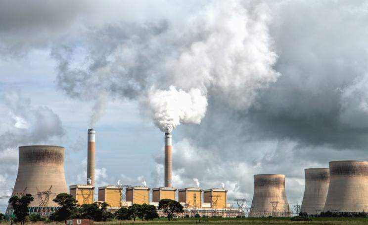 The emissions from a Nuclear Plant mix with the clouds above