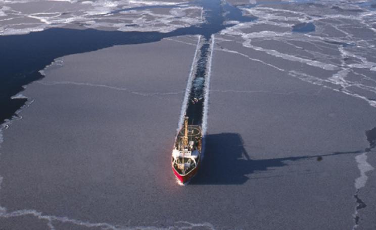 A ship breaking through Arctic ice